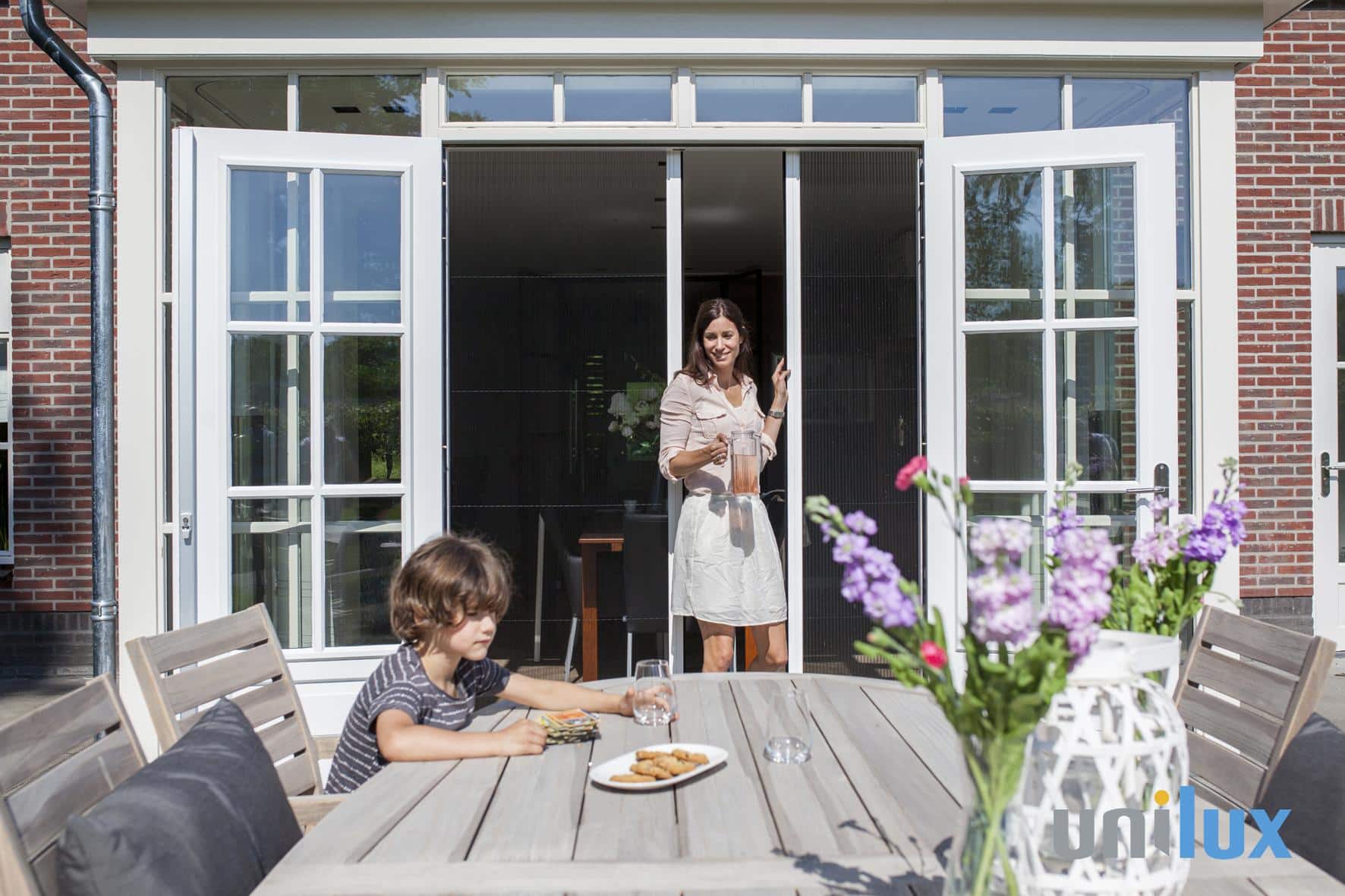 Plissefit hordeur dubbel (4) Hordeur in een schuifpui